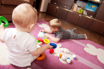 Wall Mural - Brother and sister playing