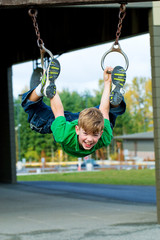 Wall Mural - Child having fun on playground during recess