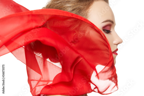 Fotografie, Obraz Model with waving red silk scarf. Vamp style, lady in red