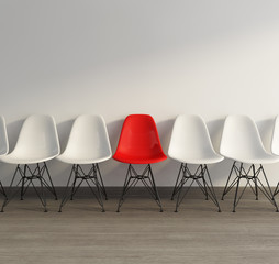 Interior with vintage plastic colored chairs on wood floor