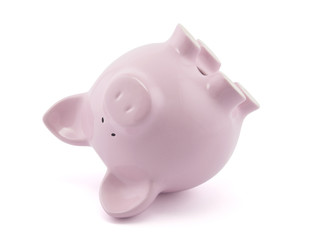 Canvas Print - Pink piggy bank upside down. Clipping path included.