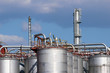 © tomas - steel tanks and pipe in oil refinery