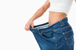 © WavebreakmediaMicro - Woman wearing too large pants