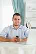 © WavebreakmediaMicro - Businessman texting on his cellphone