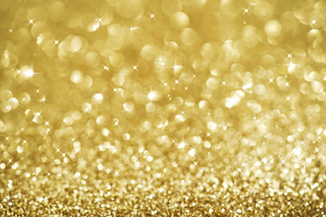 Wall Mural - christmas glittering background. holiday gold abstract texture