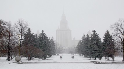 Wall Mural - building of Moscow State University, snowfall at winter