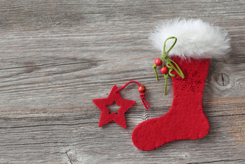 Wall Mural - Christmas stocking on wooden background