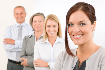 Wall Mural - Business team happy standing in line portrait