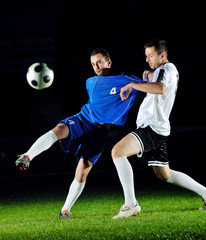 Wall Mural - football players in action for the ball