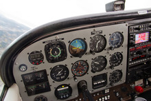 Pilot's View Of Complex Instrument Panel Of Small Airplane