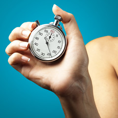 Wall Mural - woman pushing stopwatch