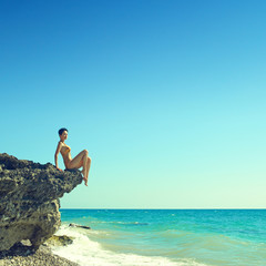 Wall Mural - Beautiful woman on beach