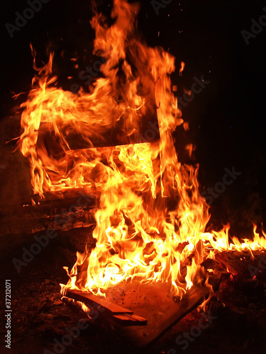 Fotografie, Obraz a huge column of flames on a black background