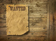 Wild West wanted poster on old wooden wall