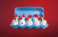 Group Of Happy Eggs Dressed In Santa-Claus Red-white Hats
