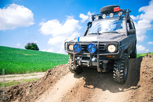 Fotografia  Offroad through muddy field