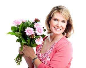 Canvas Print - Happy senior woman with flowers.