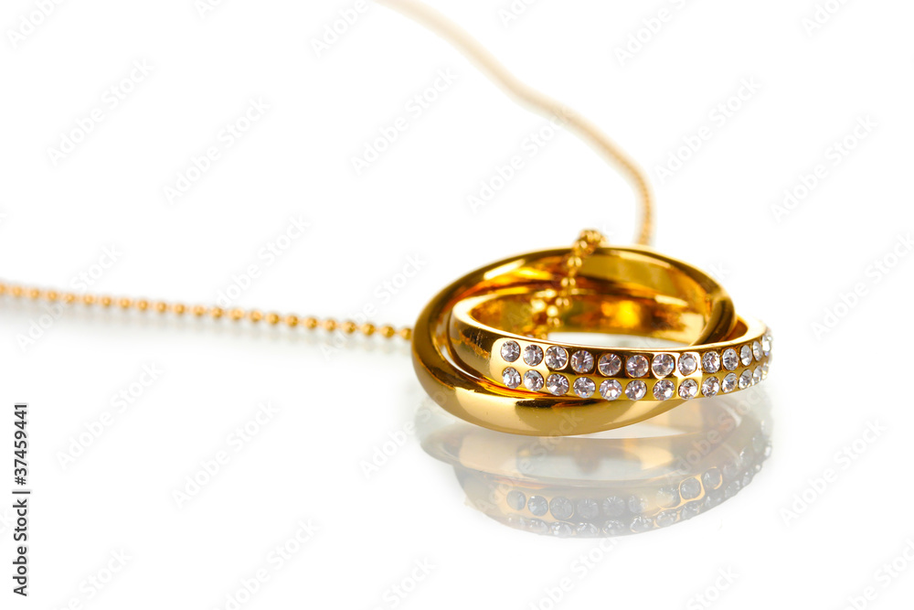 Pendant in form of rings with gem isolated on white