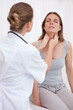 © WavebreakmediaMicro - Doctor examining patients throat