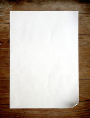 Wall Mural - Old paper on wooden background