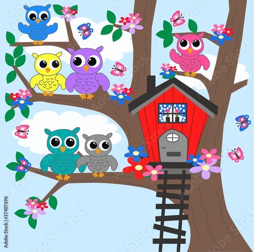 Fototapeta na wymiar colorful owls in a tree