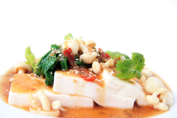 Wall Mural - Chinese tofu with xo sauce and mushroom on white background