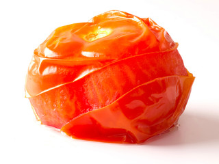 Wall Mural - close up of baked tomato on white