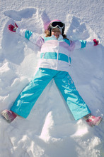 Snow Angel - Little Girl  Playing In Snow
