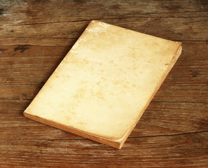 Wall Mural - Old book on wooden background