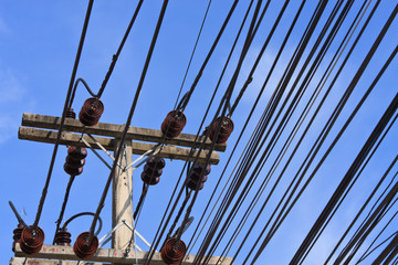 closeup electricity agianst blue sky