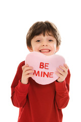 Wall Mural - Child with Valentine's Day heart pillow