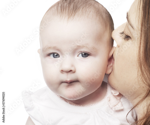 Mom Whispering To Baby Daughter Buy This Stock Photo And - 