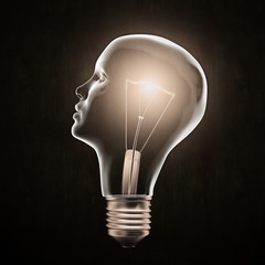 Wall Mural - Head shaped light bulb - creativity concept