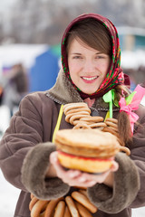 girl with pancake  during  Shrovetide