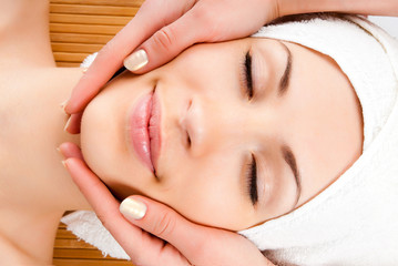 Wall Mural - woman receiving facial massage