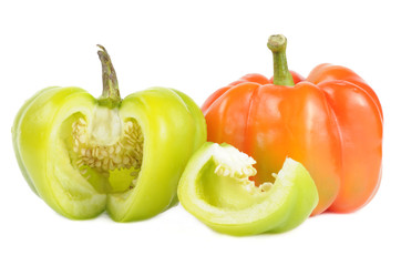 Wall Mural - Red and Cut Green Bell Peppers Isolated on White Background
