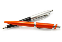 Two Ball Pens On A White Background