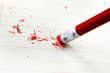 closeup of a pencil eraser correcting a mistake