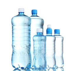 Wall Mural - Group plastic bottles of water isolated on white