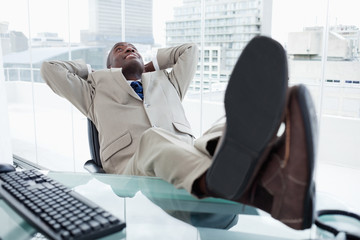 Wall Mural - Happy businessman relaxing