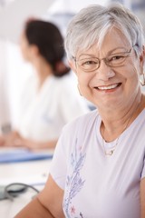 Wall Mural - Portrait of smiling senior woman