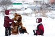 © Natalya Antoshchenko - Family cheerfully play to snow