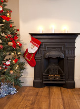 Christmas Stocking On Victorian Fireplace