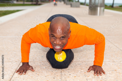 Fotografie, Obraz Handsome Man Exercising in Miami South Beach