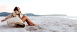 © Daxiao Productions - Beautiful young woman relaxes on the beach