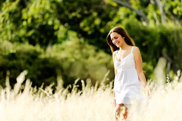 Wall Mural - happy meadow walking woman