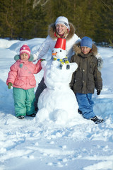 Canvas Print - Family with snowman