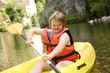 Canoeing girl with Down syndrome.