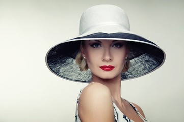 Woman in hat retro portrait.