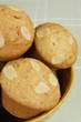 almond muffins in ceramic bowl